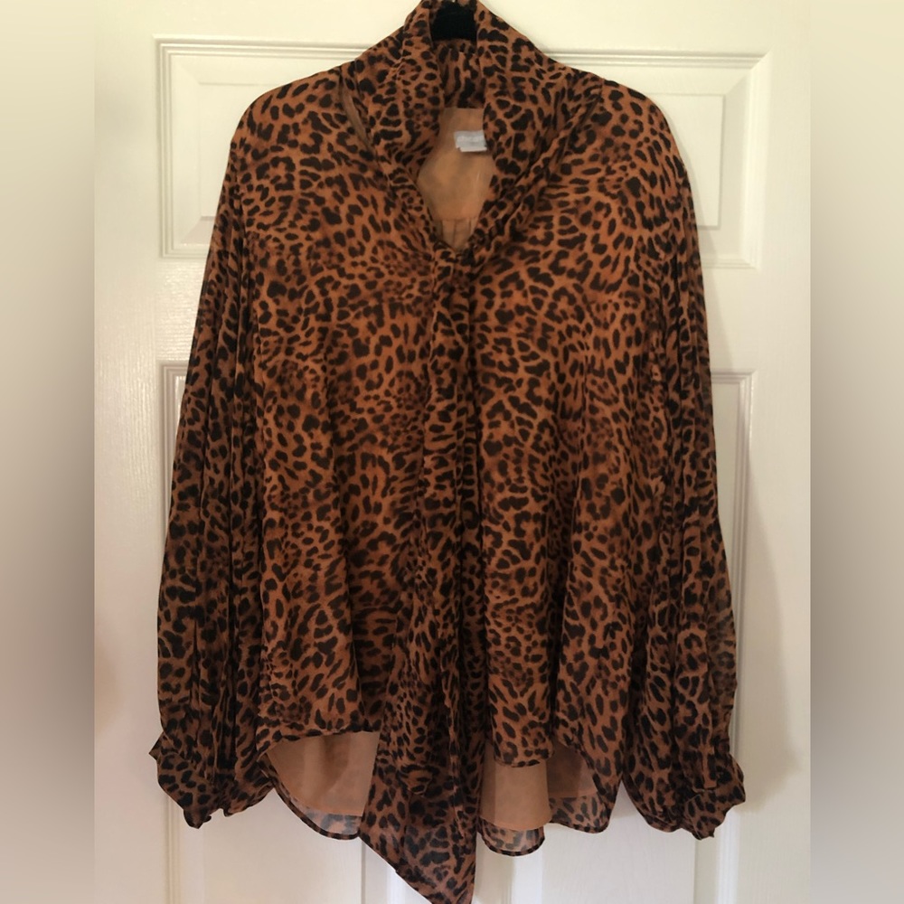 Chico’s beautiful and versatile leopard long sleeve button up top